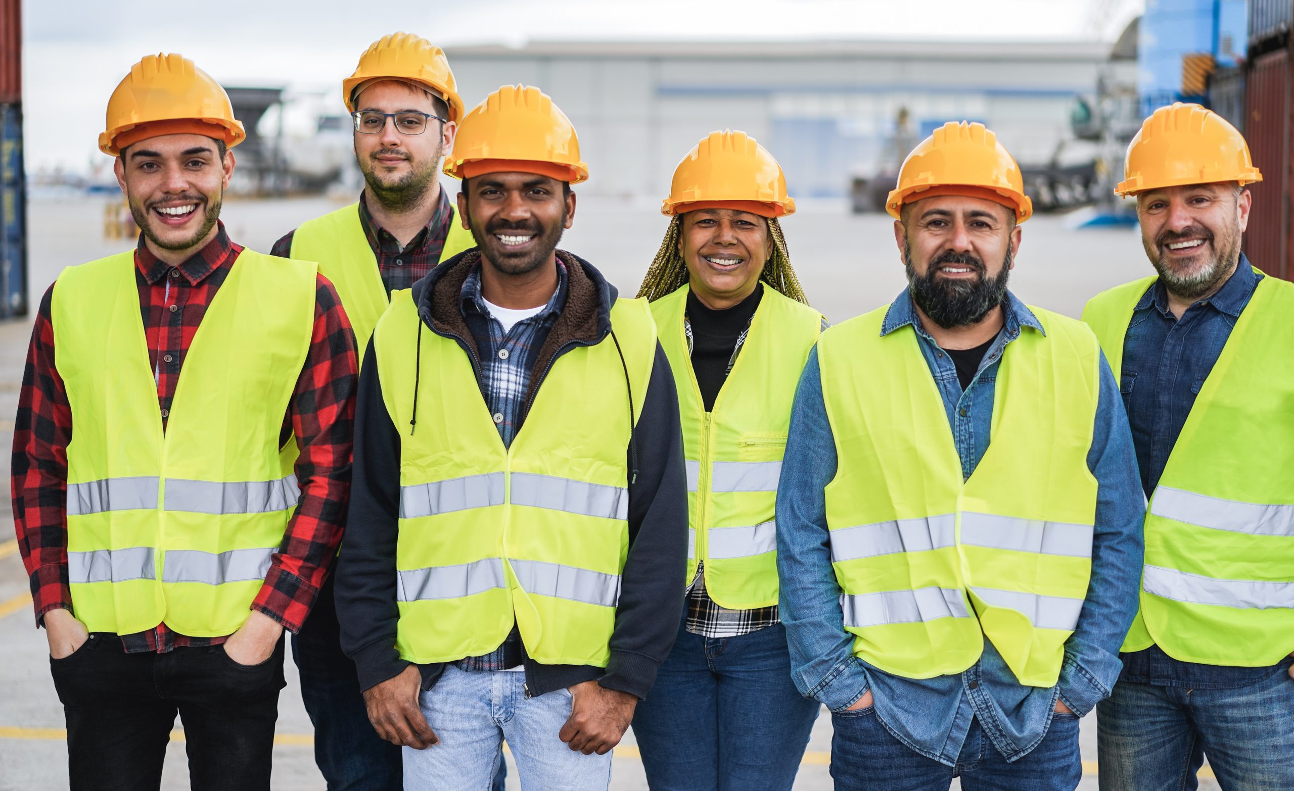 Multiracial people working together at industrial port outdoor – Focus on african senior woman face