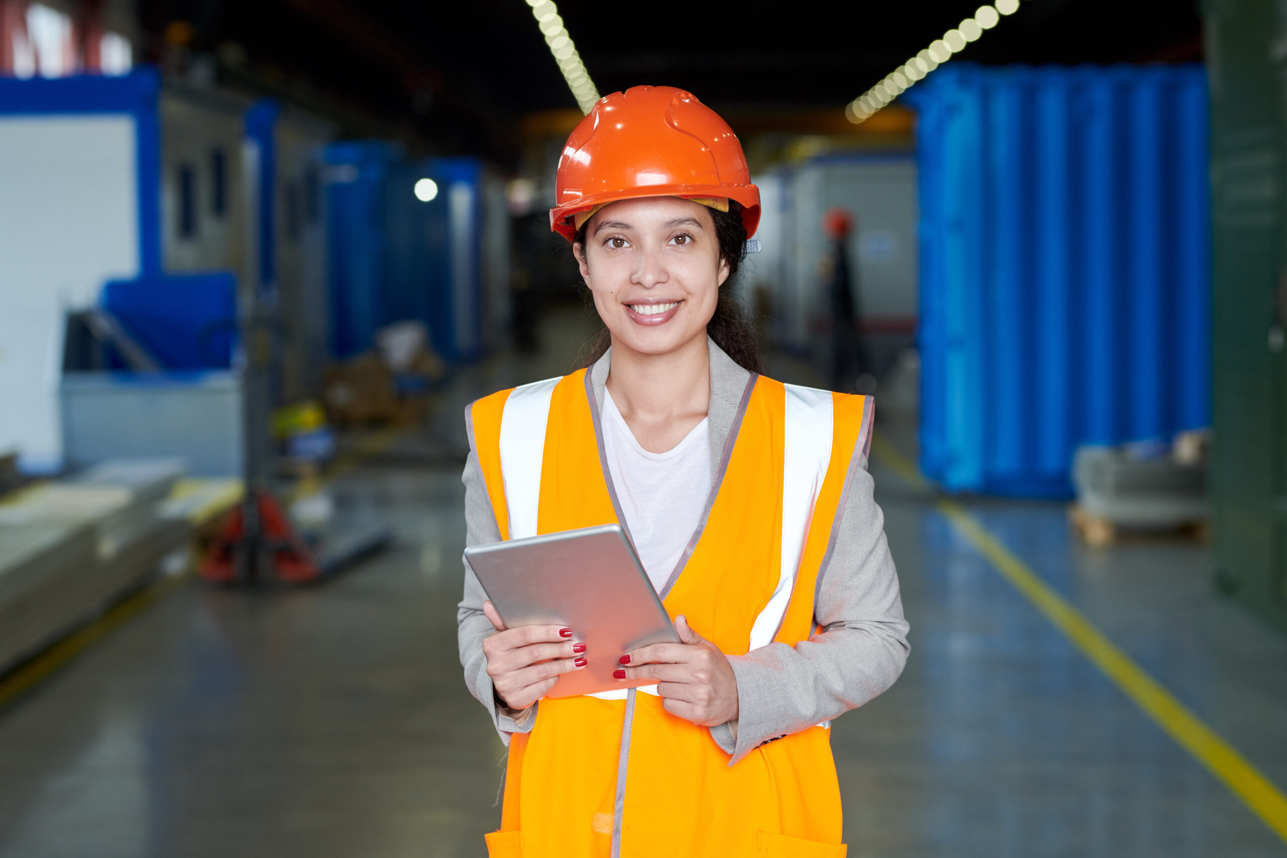 Female Factory Worker in Orange Uniform