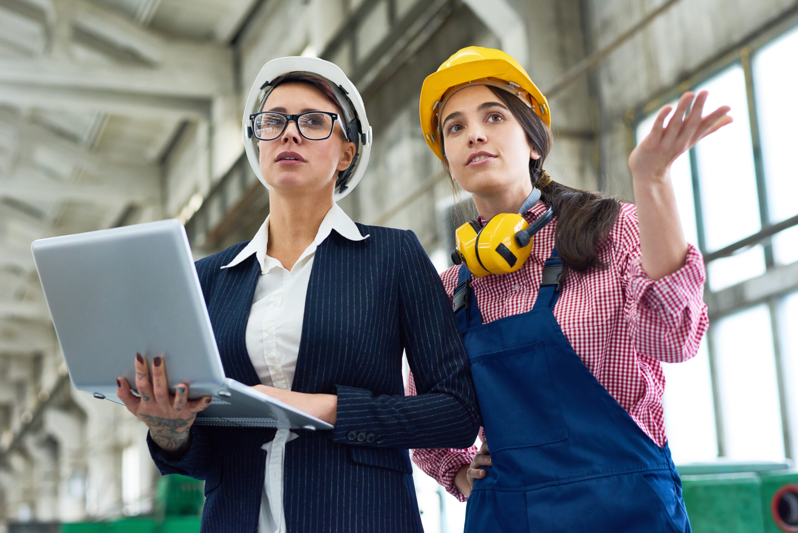 Two Women at Manufacturing Plant