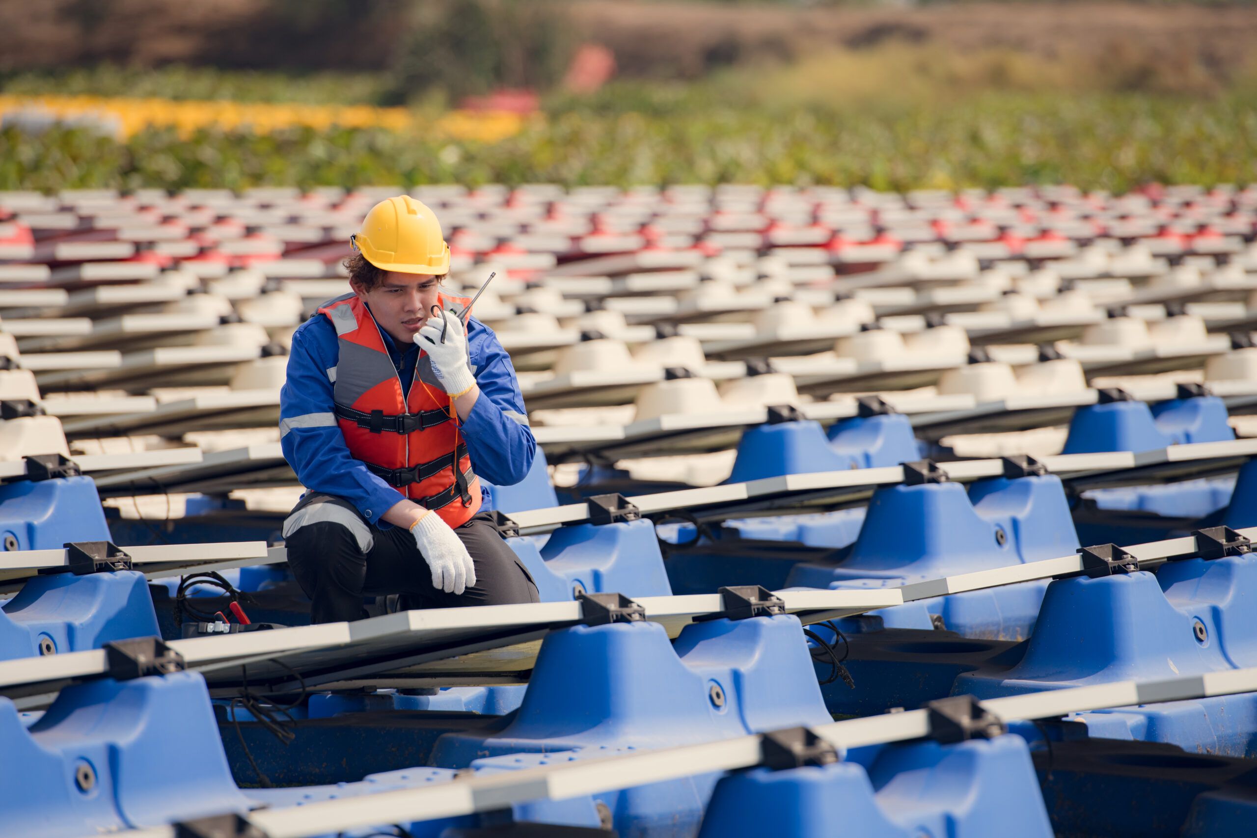Photovoltaic engineers work on floating photovoltaics. Inspect a